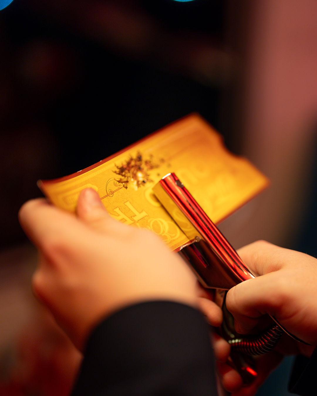 close up of golden ticket being clipped